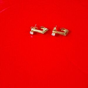 Beautiful  14k gold diamond earrings with J shaped accent